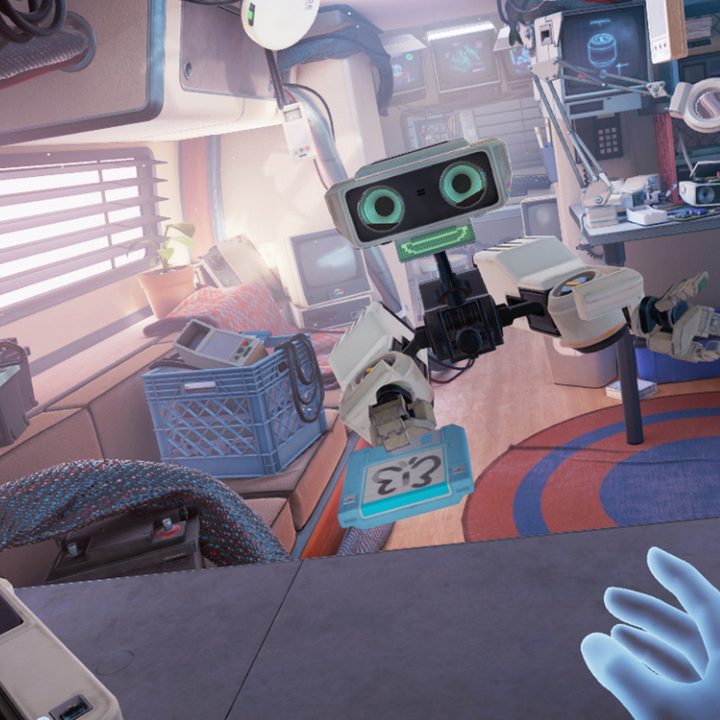 Robot handing player a cartridge in VR game.