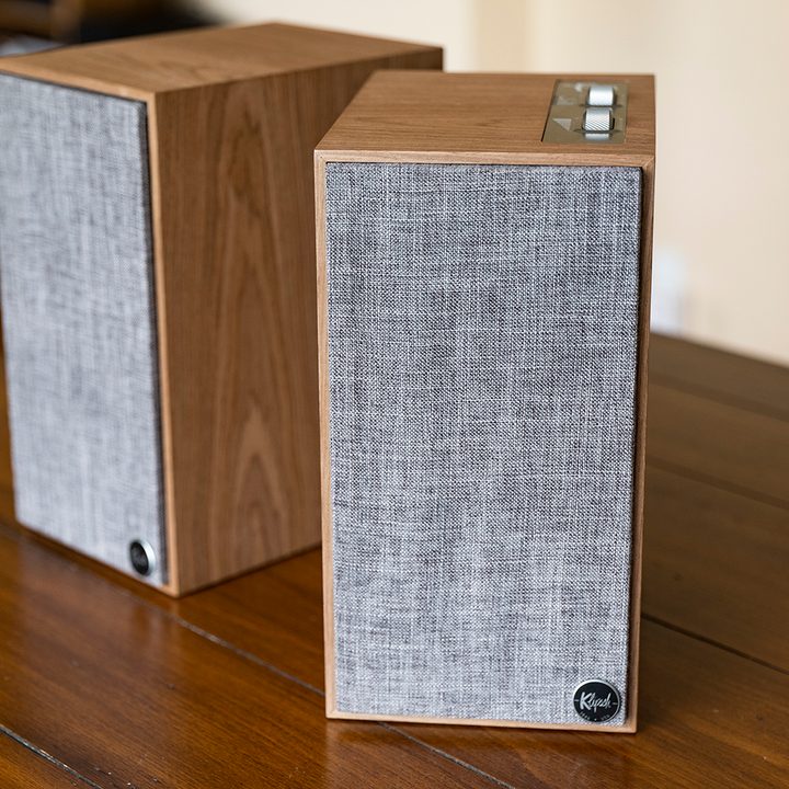 The Klipsch "The Fives" speakers on a desk.