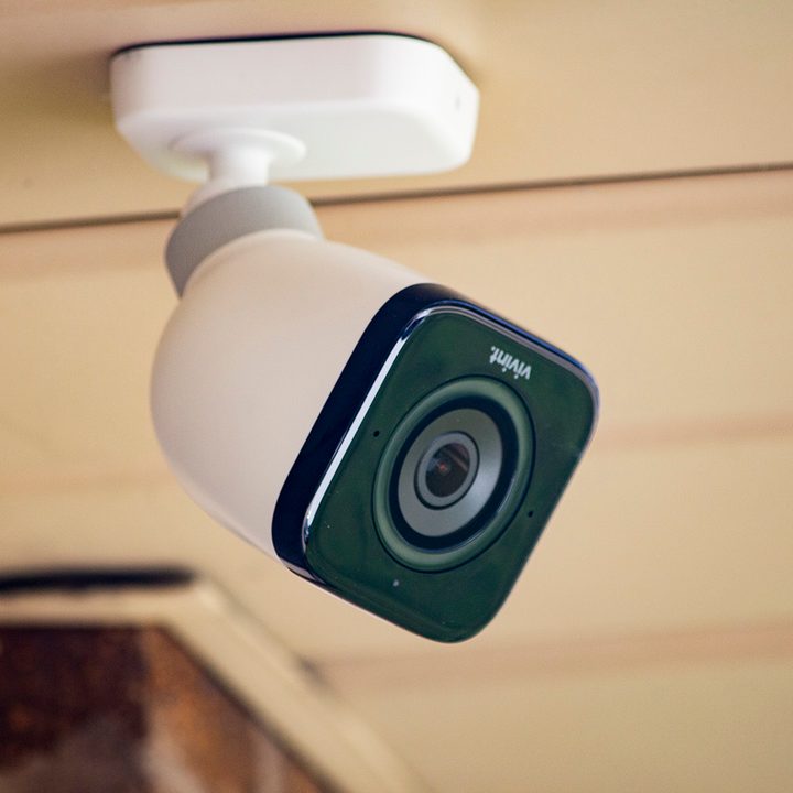 Vivint outdoor camera fashioned to surface outdoors.