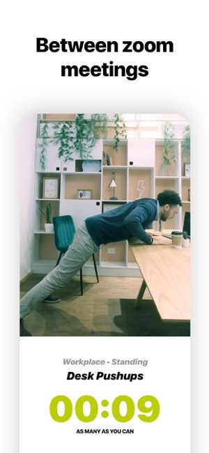 Screenshot of Wakeout app showing a man exercising at an office table, with text saying Between Zoom meetings