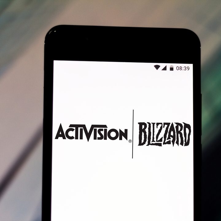 A phone screen displaying Activision Blizzard's logo.