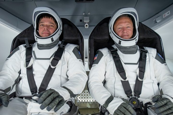 NASA astronauts Bob Behnken (left) and Doug Hurley (right) participate in a test of the Crew Dragon capsule