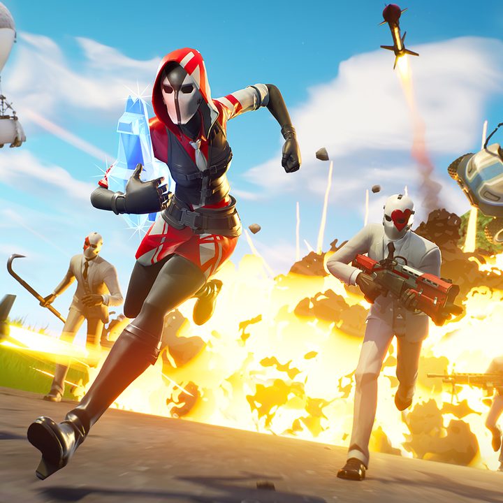 Fortnite characters running away from an explosion.