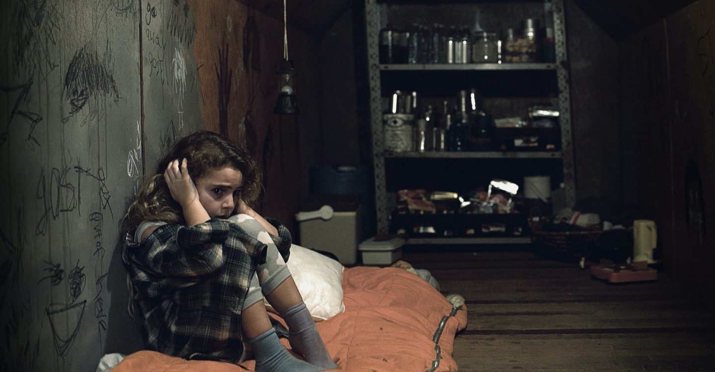 Chloe in a room in Freaks.