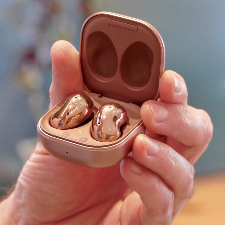 The Samsung Galaxy Buds Live inside their charging case.