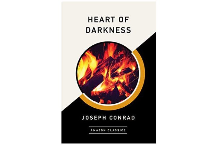Photo shows the cover of the book which is half white, half black and features the title in black letters at the top. In the middle is a circular picture of a fire with the author's name at the bottom in white letters