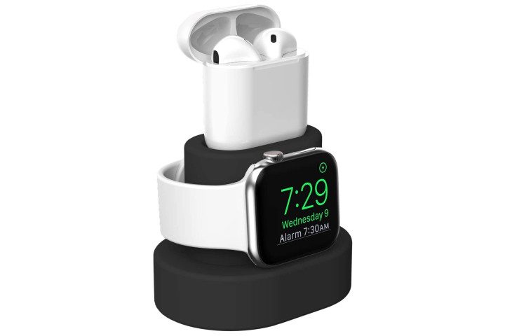 Photo shows an Apple Watch and AirPods charging on a stand