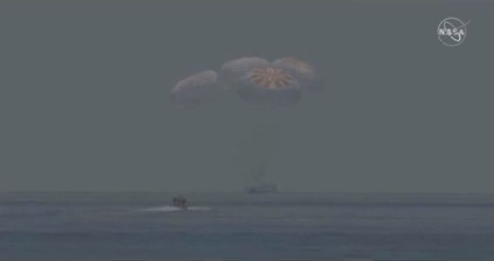 Crew Dragon spacecraft splashes down