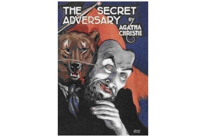 Picture shows the book cover with the title and author name at the top and an illustration of somebody in a suit dressed as a bear, holding a creepy mask