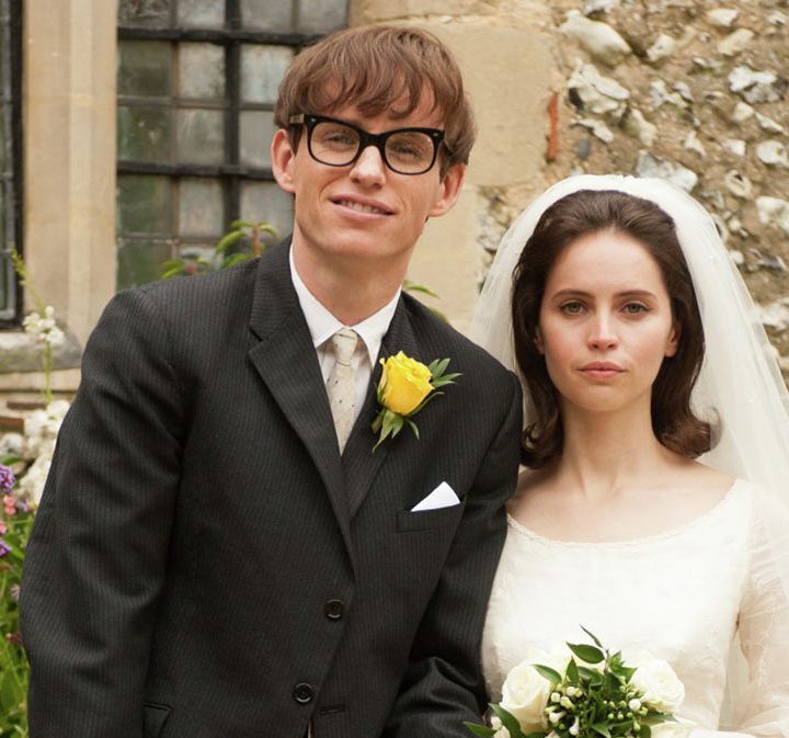 Eddie Redmayne and Felicity Jones pose in wedding attire in The Theory of Everything.