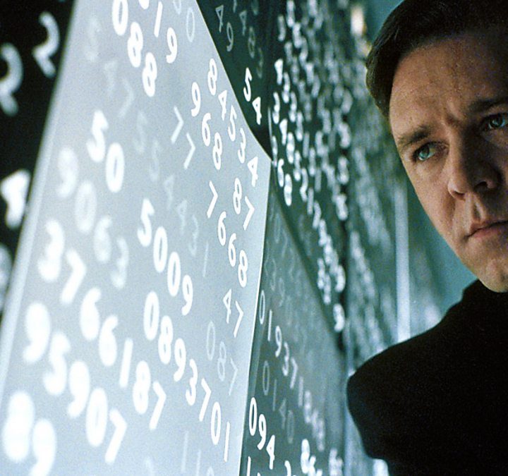 Russell Crowe stares at numbers on a wall in A Beautiful Mind.
