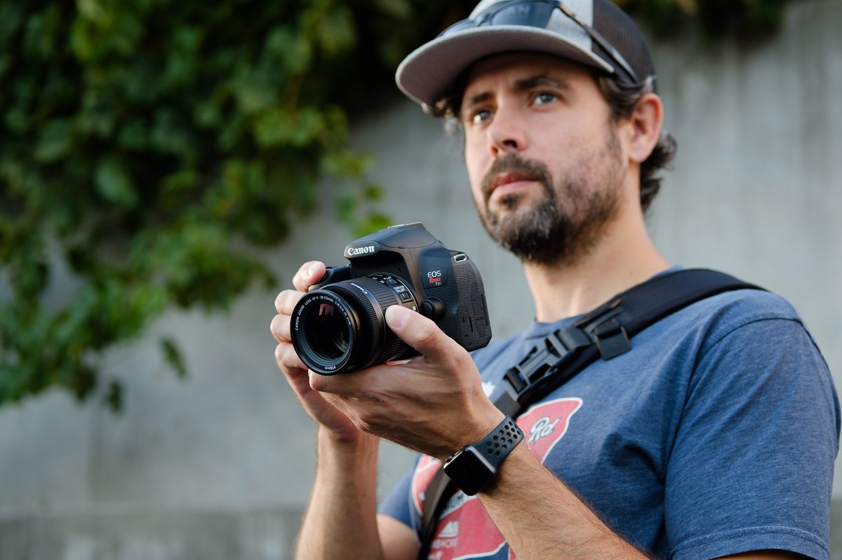 Product photo of Canon EOS Rebel T8i in hand