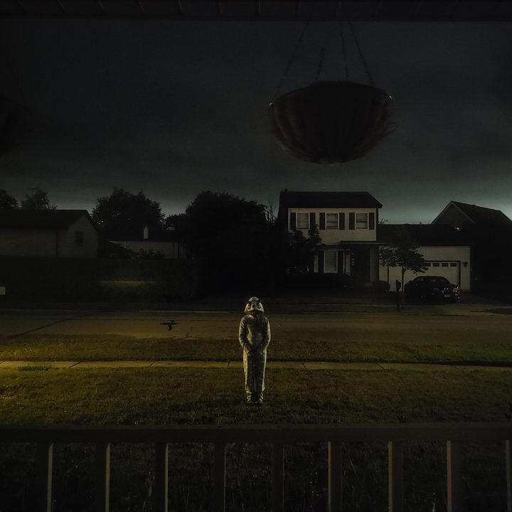 Girl standing in front of my house taken with LG V60 in night mode