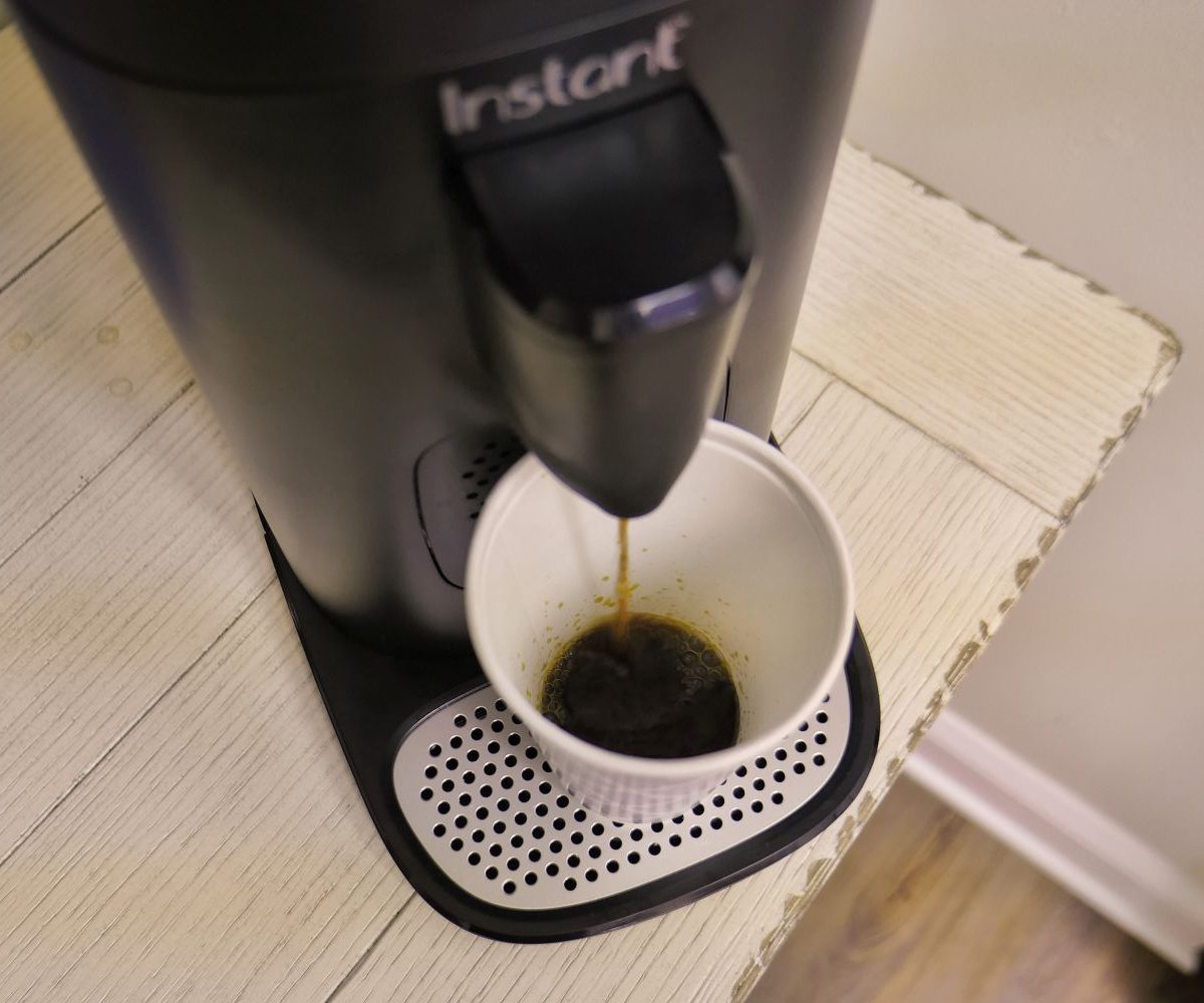 Instant Pod dispensing coffee