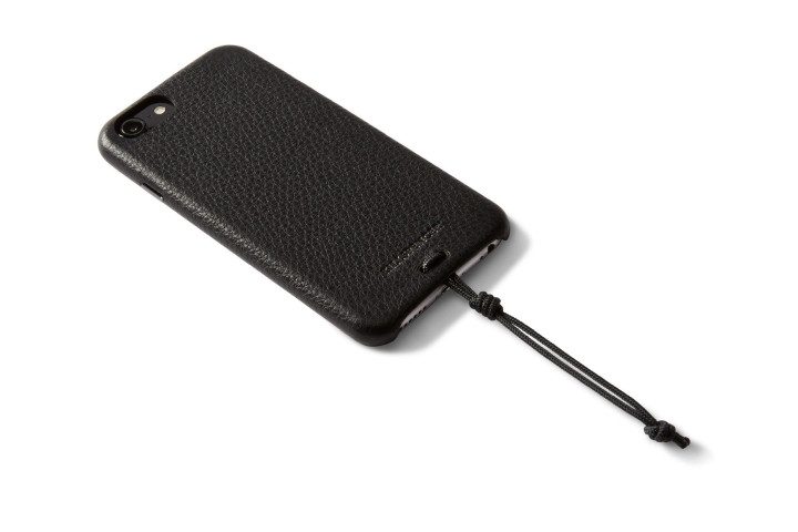 Photo shows the rear view of an iPhone 7 in a black textured case from Killspencer