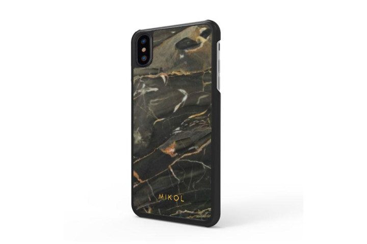 Photo shows the rear view of an iPhone XS in a gold marble case from Mikol