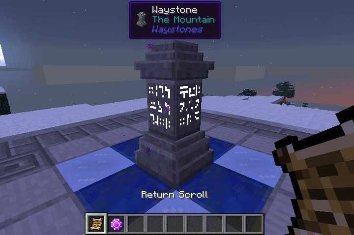 A player looking at a pillar and the words "Waystone: The Mountain".
