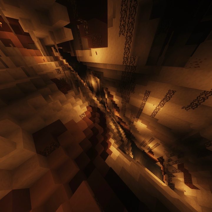 A deep and glowing chasm in Minecraft.