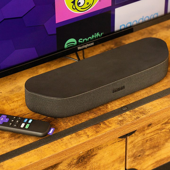 The Roku Streambar on a media console.