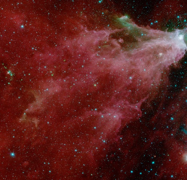 This image shows data from NASA's Spitzer Space Telescope, from the IRAC instrument, with colors corresponding to wavelengths of 3.6, 4.5, 5.8 and 8.0 m (shown as blue, green, orange and red).
