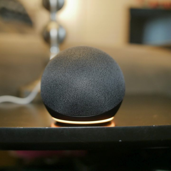 Amazon Echo Dot (4th Gen) LED light ring shining.