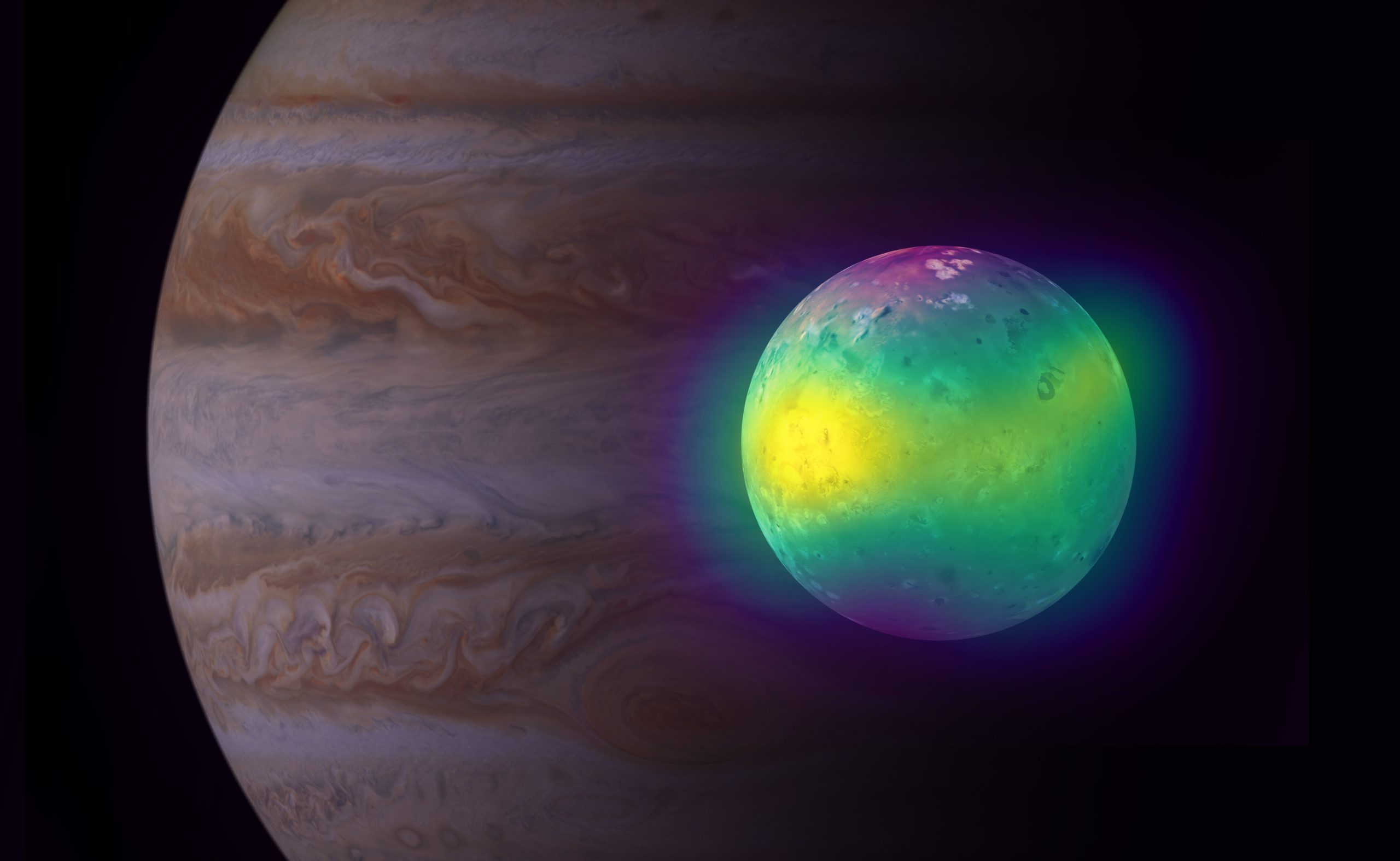 Composite image showing Jupiter's moon Io in radio (ALMA), and optical light (Voyager 1 and Galileo). The ALMA images of Io show for the first time plumes of sulfur dioxide (in yellow) rise up from its volcanoes. Jupiter is visible in the background (Cassini image).