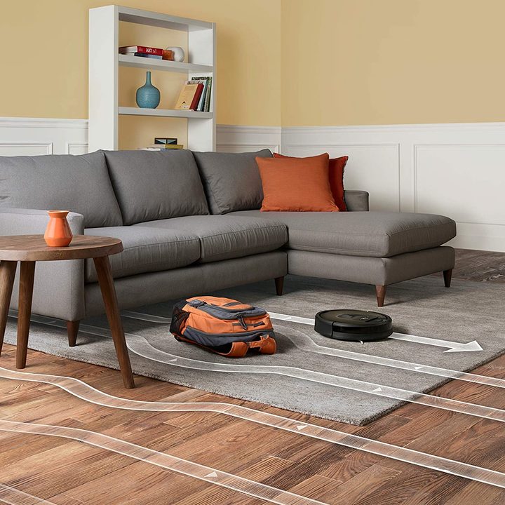 iRobot Roomba 981 Robot Vacuum avoiding backpack.