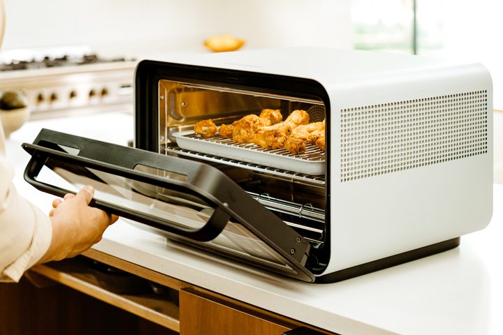 June Smart Oven open on counter.