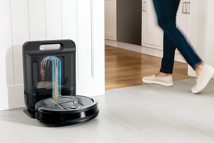 The Shark IQ Robot Self-Empty XL robot vacuum emptying its contents.