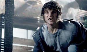 Teen Wolf gritting his teeth and looking angry.