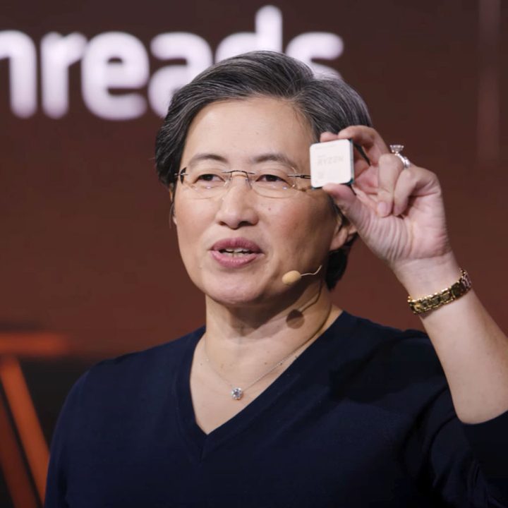 AMD CEO Lisa Su holds up the Ryzen 5900X chip.
