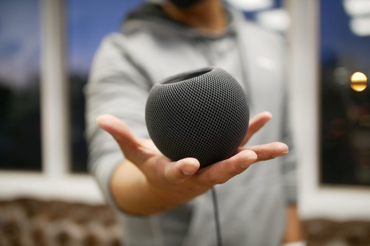 Apple HomePod mini in hand