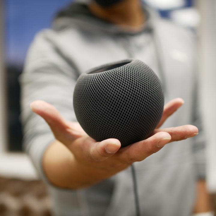 Apple HomePod mini in hand