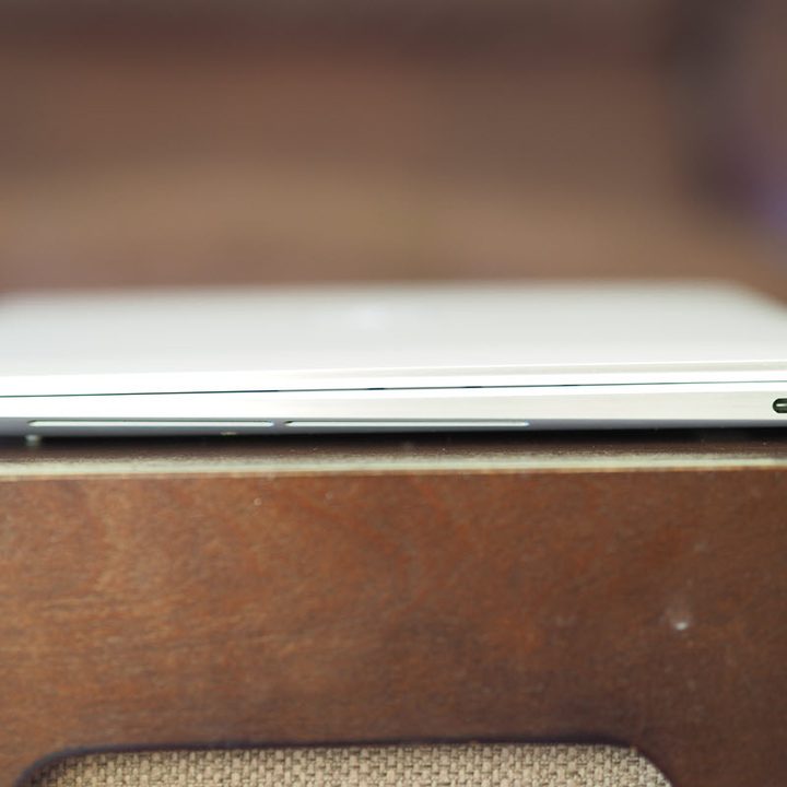 Side view of a Dell XPS 13 9310 showing charging port.