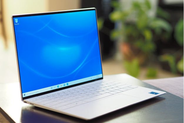 Dell XPS 13 9310 front view showing angles, ports, display, and keyboard.