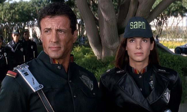 Sylvester Stallone and Sandra Bullock in Demolition Man.