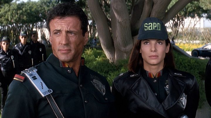 Sylvester Stallone and Sandra Bullock in Demolition Man.