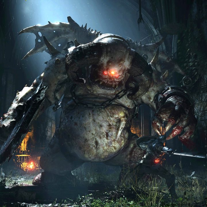 The protagonist of Demon's Souls going up against a massive creature.