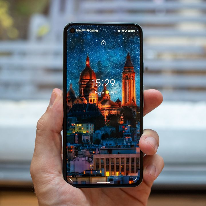Google Pixel 5 held in a hand.