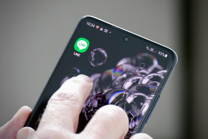 A person about to use the Line messaging app.