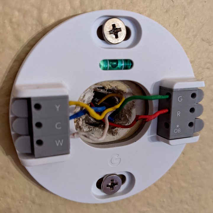 to remove the nest from the wall, press the levers and pull the wires out.