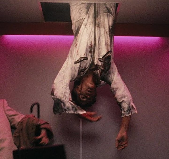 A body hanging upside down in The Lift.