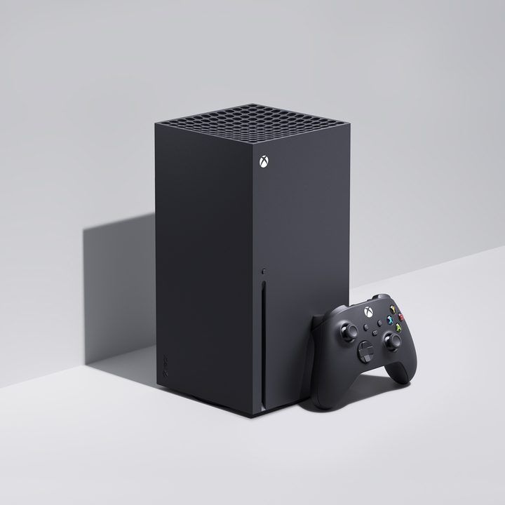 Xbox Series X sitting against a wall.