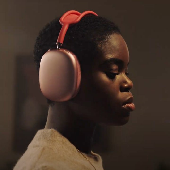 Woman wearing Apple Airpods Max.