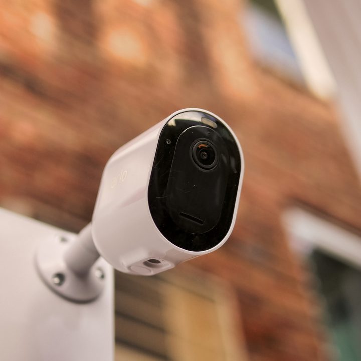 Arlo Pro 4 Spotlight Camera mounted outside.
