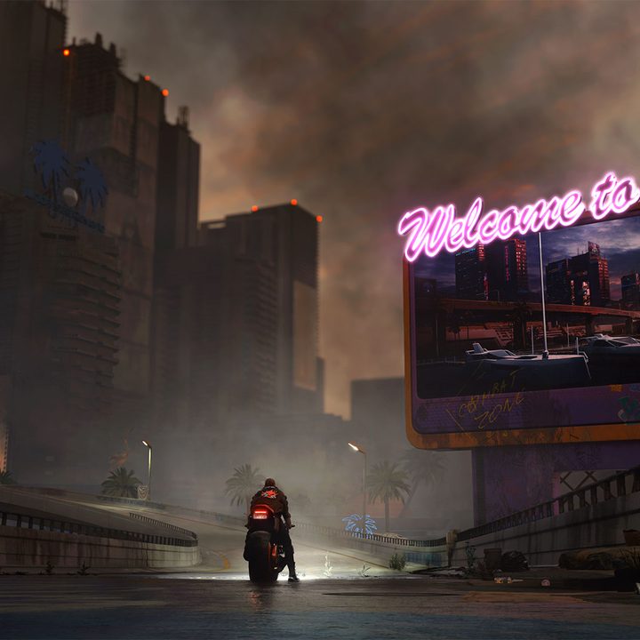 A character rides a motorcycle down a vacant street in Cyberpunk 2077.