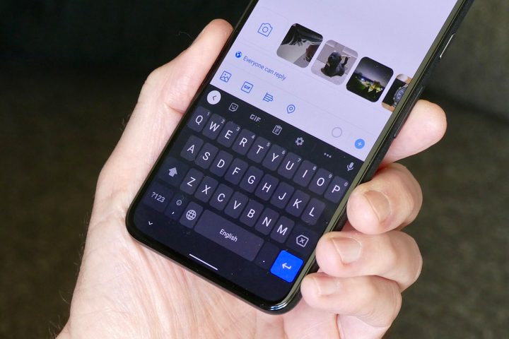 A person using the Gboard keyboard.