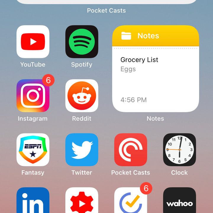 iPhone home screen showing various apps and widgets.