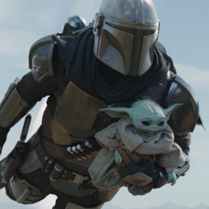 The Mandalorian flies with Grogu.