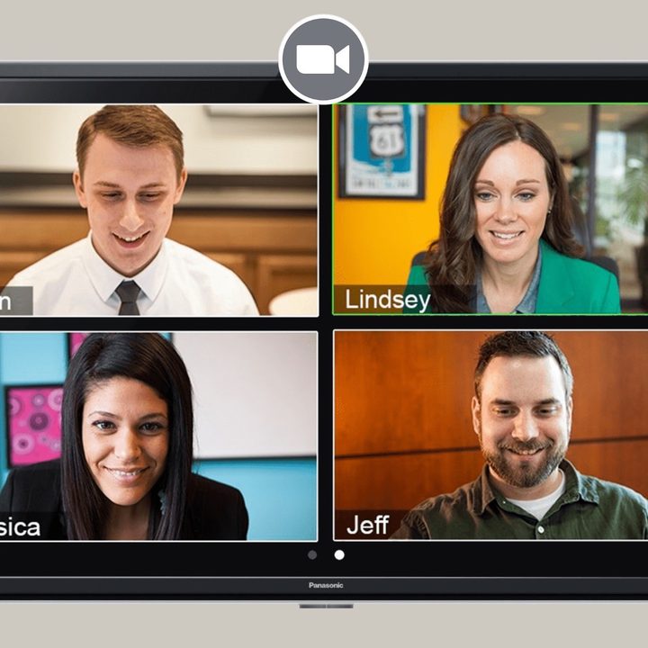 Zoom video call showing participants looking down at screens